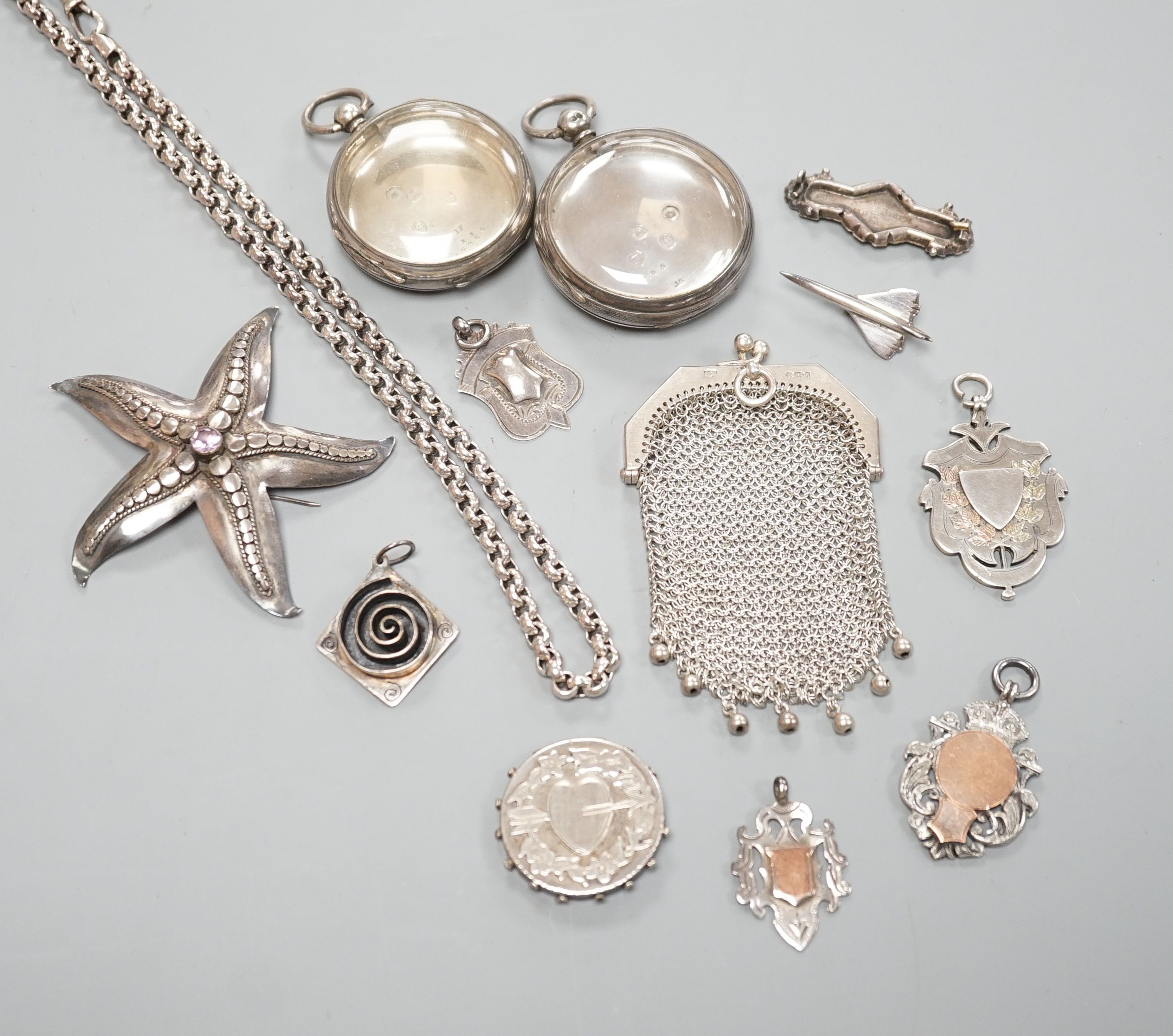 A small group of mainly silver and white metal jewellery including belcher chain, brooches, medallions, evening purse etc. and two silver pocket watch cases.